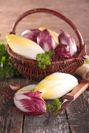 fresh chicory on basketの写真素材