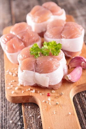 raw meat on boardの写真素材