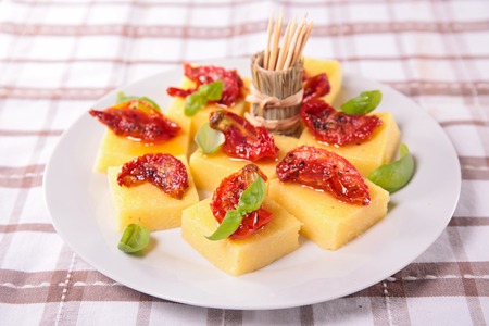appetizer, polenta,tomato and basilの写真素材