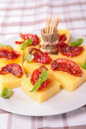 appetizer,polenta and dried tomatoの写真素材