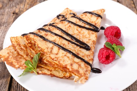 crepe with chocolate and raspberryの写真素材