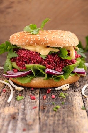 buger with quinoa and beetroot steakの写真素材