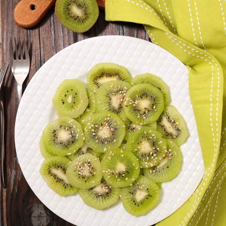slices of kiwi for breakfastの写真素材