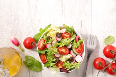 fresh salad with tomato and radishの写真素材