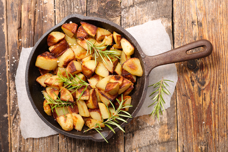 fried potato and rosemaryの写真素材