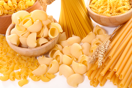 raw pasta isolated on whiteの写真素材