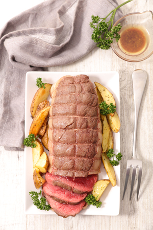  baked roast beef with vegetablesの写真素材