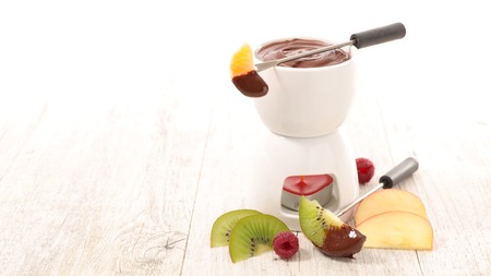 chocolate fondue with fruitsの写真素材