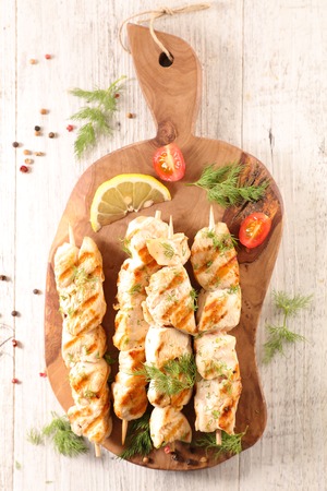 grilled chicken on boardの写真素材