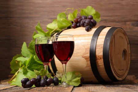 wooden barrel with red wine
