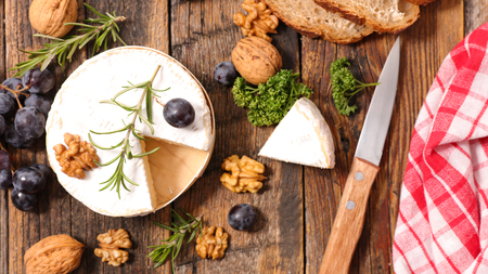 camembert with walnut and grapdeの写真素材