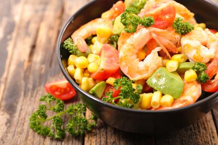 bowl of vegetable salad with shrimpの写真素材