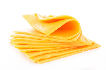 cheddar cheese sliceの写真素材