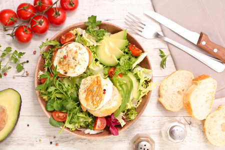 goat cheese toast and saladの写真素材