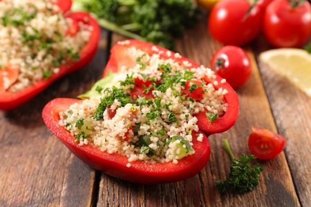 stuffed bell pepper with semolina and herbsの写真素材