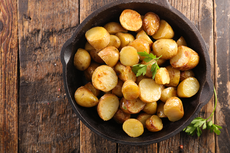 roasted potato and herbsの写真素材