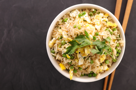 fried rice and chopsticksの写真素材