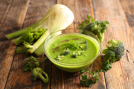 vegetable soup on wood backgroundの写真素材