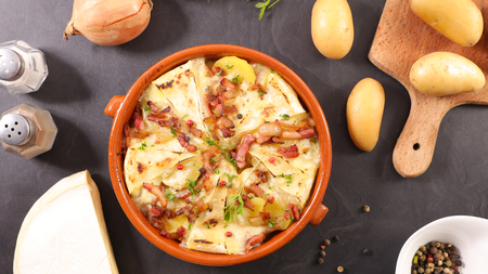 french tartiflette, potato, bacon and reblochonの写真素材