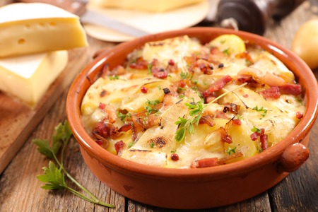 tartiflette, baked potato, bacon and cheeseの写真素材