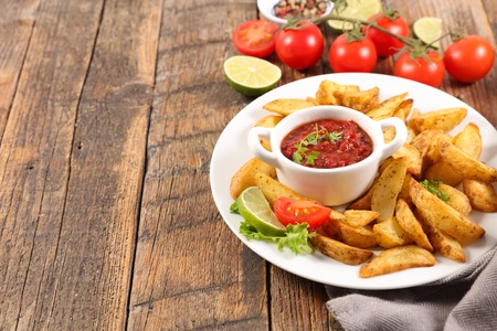 french fries or wedge potatoの写真素材