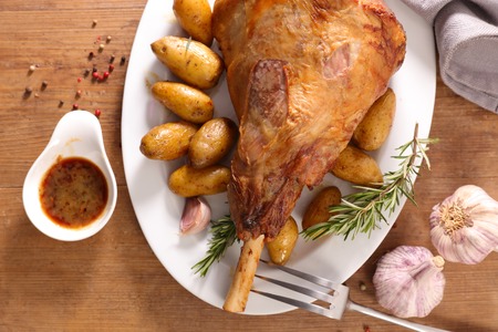 grilled lamb leg and potatoesの写真素材