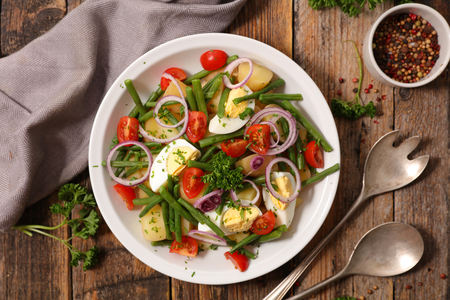 vegetable salad with egg, potato, bean and onionの写真素材