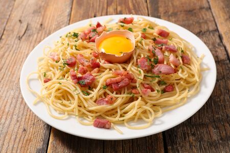 carbonara spaghetti with bacon, cheese and eggの写真素材