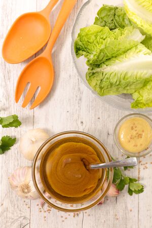 sauce with garlic and spice, lettuceの写真素材