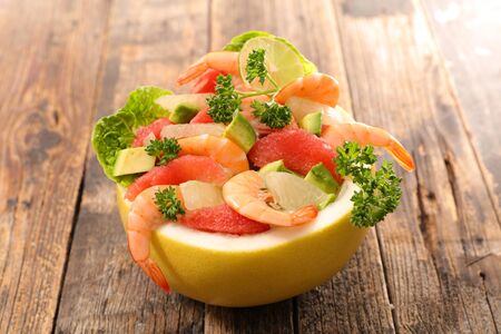 grapefruit salad with shrimp and avocadoの写真素材