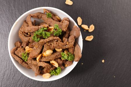 fried beef with soy sauce and peanutの写真素材