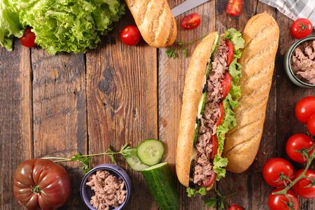 Sandwich with ingredient on wooden tableの写真素材