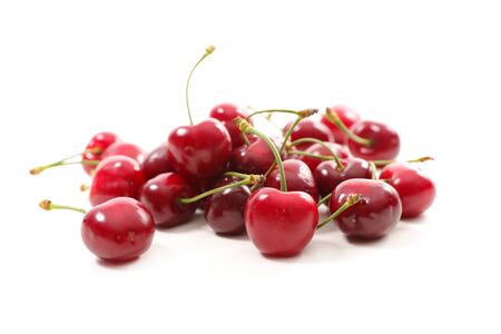 group of cherries fruits isolated on white backgroundの写真素材