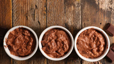chocolate mousse- vegan chocolate dessert on wood backgroundの写真素材