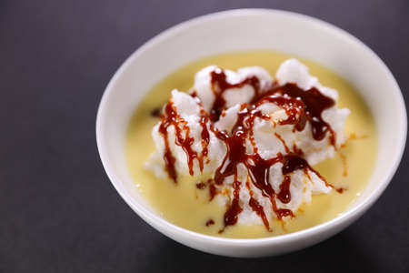 floating island- custard creme and caramelの写真素材