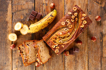 homemade banana bread on wood backgroundの写真素材