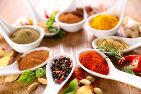 various spices on wood backgroundの写真素材