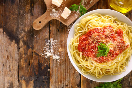 spaghetti with tomato sauce and parmesanの写真素材
