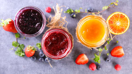 assorted of jam and berry fruitの写真素材