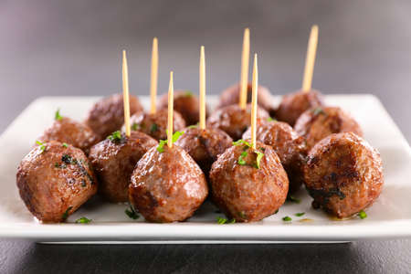 fried meatball and herbs