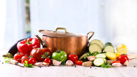 cooking pan and vegetables and spices