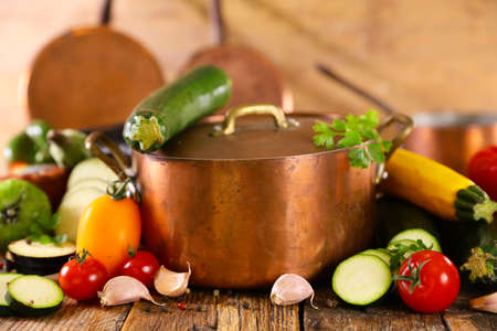 cooking pot and vegetables and spicesの写真素材