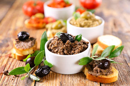 assorted of antipasto, tapenade with tree branchの写真素材