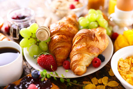 gourmet croissant with fresh fruitsの写真素材