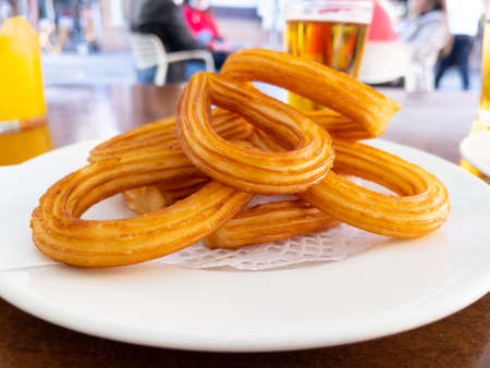 traditional churros in plate - Spainの写真素材
