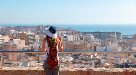 Woman tourist against city background- Spainの写真素材