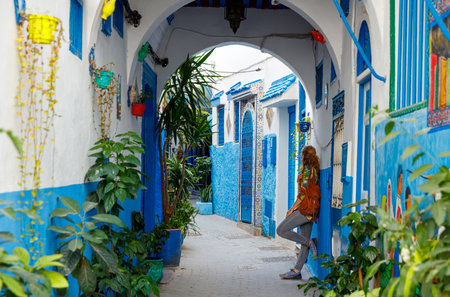 Woman tourist in Tangier street medina, Morocco