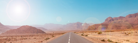 Road in desert landscape in Moroccoの写真素材