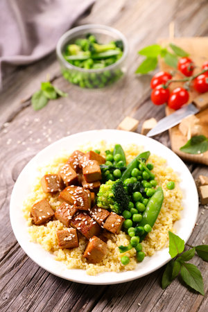 fried tofu, green vegetable with soy sauceの写真素材