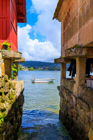 street view of atlantic ocean and fishing boat- Galicia in Spain- Combarro